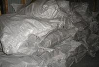 280 bags of 50 lbs each = 14000 lbs in 20ft container